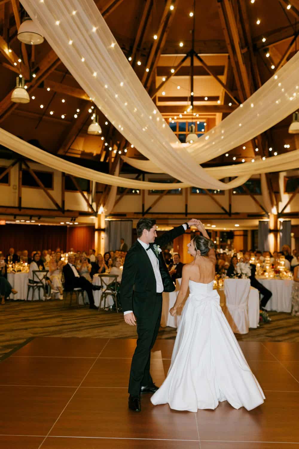 Bride and groom dancing at wedding reception in Vermont.