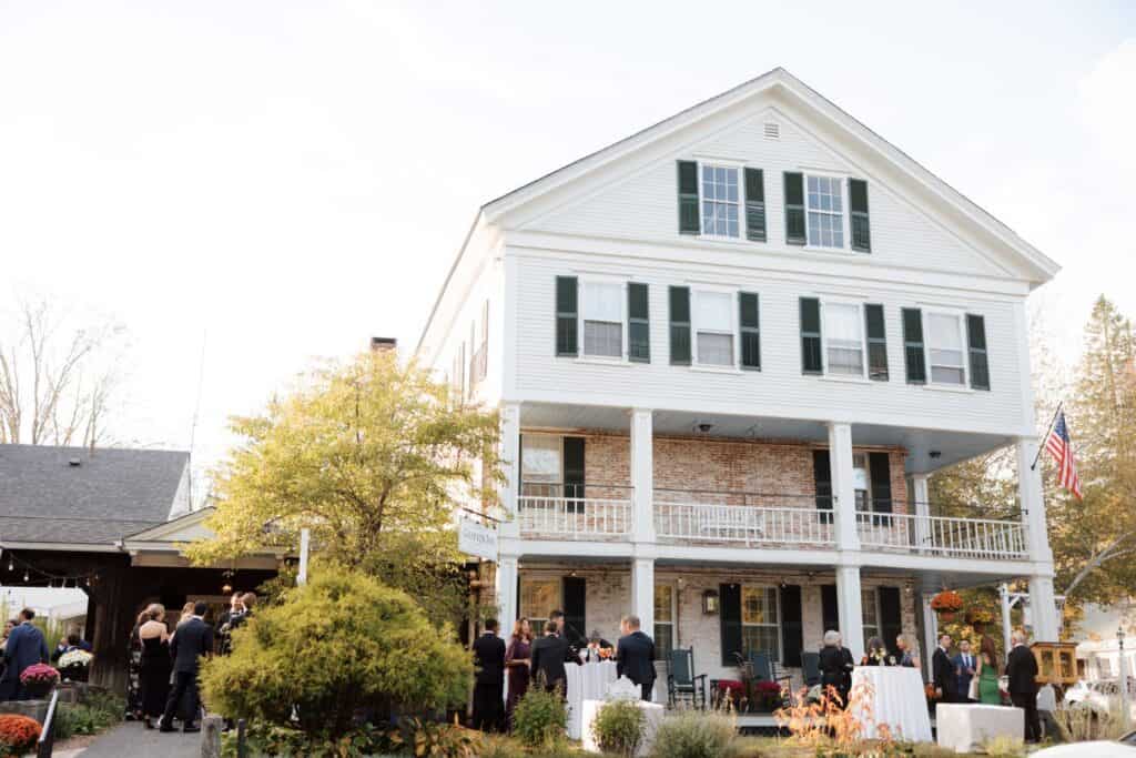 Wedding celebration at The Jackson in Vermont with guests and scenic backdrop.
